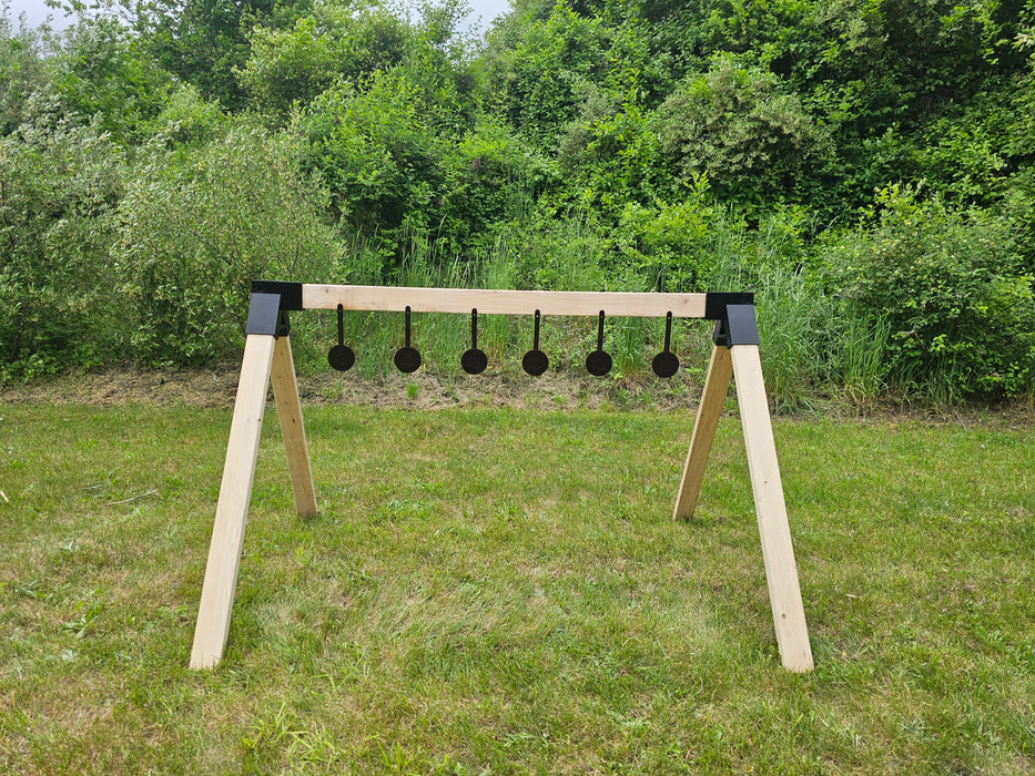 row of self healing pistol shooting targets at outdoor range