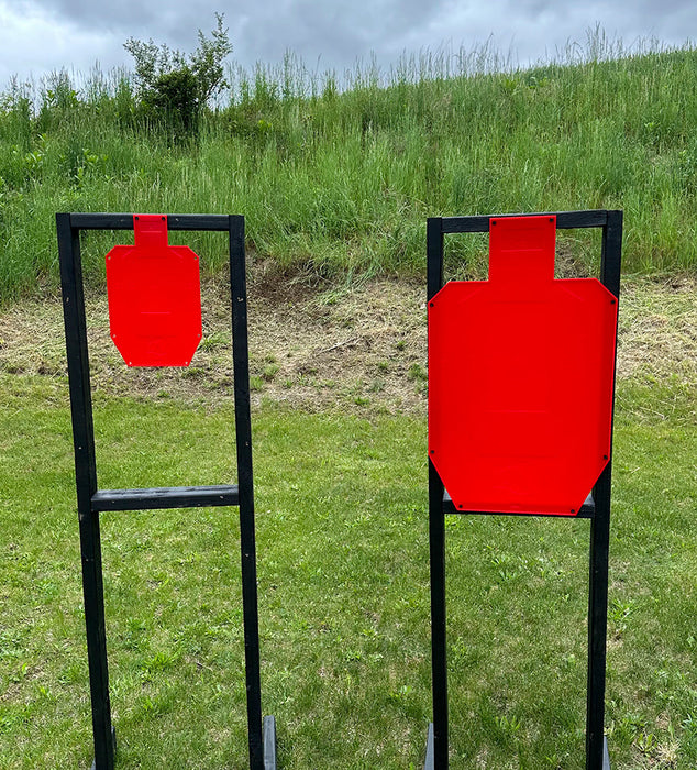 full size and half size red silhouette shooting target mounted to black shooting stand used for shooting targets