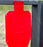 close image of red half silhouette shooting target used for target practice