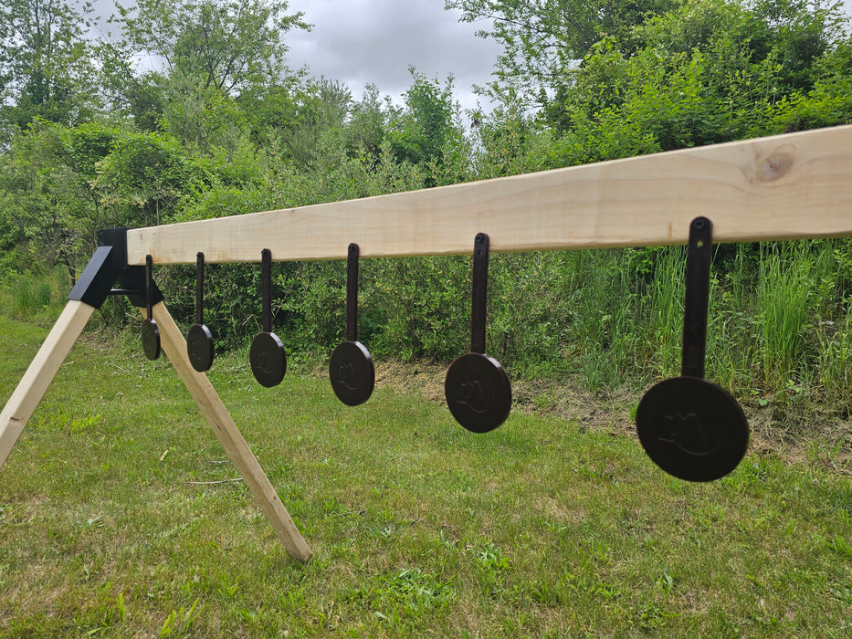 row of self healing pistol shooting targets at outdoor shooting range