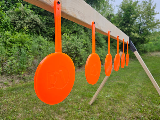 a row of bright orange self healing targets