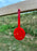 red self healing shooting target that changed color at the point of impact from pistol shooting