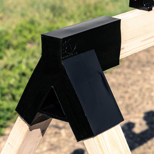 close up of target stand bracket at outdoor shooting range