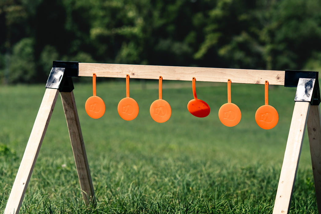 target stand set up with self healing gong targets at outdoor range